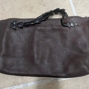 Chic Brown Leather Clutch with Unique Handle